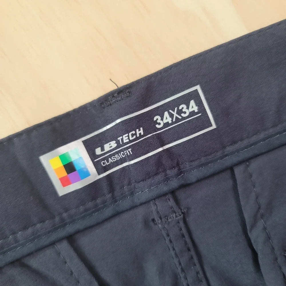UB Tech Pants Mens 34x34 Blue Comfort Adjustable Waist Chino Water Repellent NWT - Picture 13 of 16